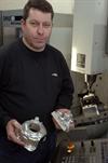 John Kenny with specialised parts on a DMG machine
