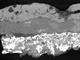 SEM image of oxide layer from ancient bronze statue