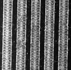 Laser induced crystalline silicon tracks on amorphous substrate