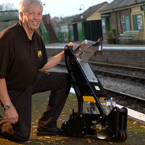 Sperry - George Dodd, Field Service Manager for Sperry International, with the company’s Walking Stick