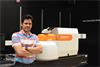 Prof. Carlos A. Carrero with his Renishaw inVia™ Qontor® Raman microscope