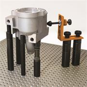 Fixturing example using a screw pusher clamp and adjustable jack stand